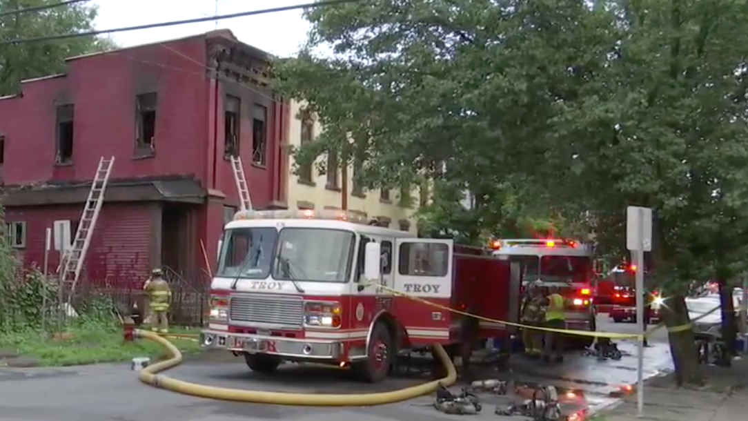 A Troy, NY, fire lieutenant suffered second-degree burns battling a two-alarm blaze that injured four others Friday.