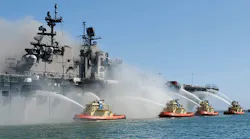 Firefighting boats work to put out the massive, multi-alarm blaze aboard the USS Bonhomme Richard in San Diego earlier this month.