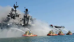 Firefighting boats work to put out the massive, multi-alarm blaze aboard the USS Bonhomme Richard in San Diego earlier this month.