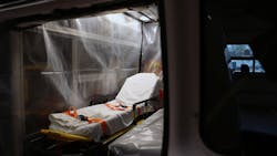 An Upper Merion, PA, Fire and EMS ambulance in wrapped in plastic sheeting for transporting COVID-19 patients. An Upper Merion, PA, Fire and EMS ambulance in wrapped in plastic sheeting for transporting COVID-19 patients.