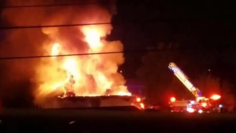 Murfreesboro firefighters found flames engulfing half the building when they arrived.