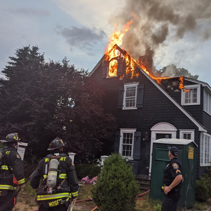 Westport, CT, firefighters, along with Norwalk fire crews, battled a blaze that broke out at a home under renovation in the Compo Beach area early Friday.