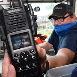 North East, PA, Fire Chief Dave Meehl shows his portable radio while riding a few miles away from the Crescent Hose Company in North East Borough. North East, PA, Fire Chief Dave Meehl shows his portable radio while riding a few miles away from the Crescent Hose Company in North East Borough.