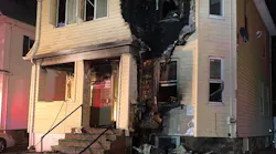 Medford, MA, firefighters rescued a mother and her young child from the second floor of a burning house early Monday.