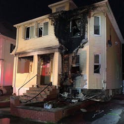 Medford, MA, firefighters rescued a mother and her young child from the second floor of a burning house early Monday. Medford, MA, firefighters rescued a mother and her young child from the second floor of a burning house early Monday.