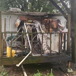 Pasco County, FL, firefighters rescued a person in a wheelchair from a burning trailer Wednesday. Pasco County, FL, firefighters rescued a person in a wheelchair from a burning trailer Wednesday.