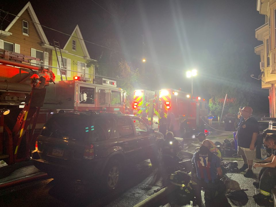 Firefighters at the scene of the two-alarm fire in Harrisburg Saturday night.