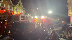 Firefighters at the scene of the two-alarm fire in Harrisburg Saturday night.