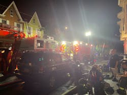 Firefighters at the scene of the two-alarm fire in Harrisburg Saturday night. Firefighters at the scene of the two-alarm fire in Harrisburg Saturday night.