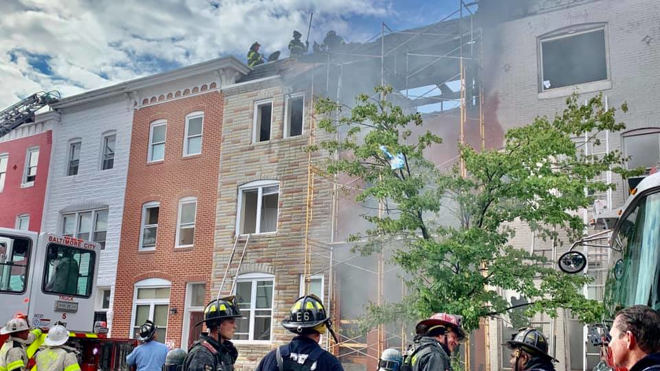 A Baltimore City firefighter was injured during a two-alarm rowhouse blaze Wednesday.
