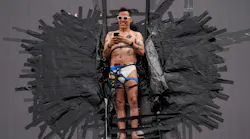 Actor Steve-O is pictured taped to a Hollywood billboard sign on Thursday, Aug. 13, 2020, in Los Angeles.