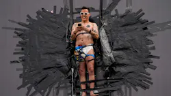 Actor Steve-O is pictured taped to a Hollywood billboard sign on Thursday, Aug. 13, 2020, in Los Angeles.
