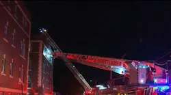 Everett, MA, firefighters rescued two people from a burning apartment building early Thursday.