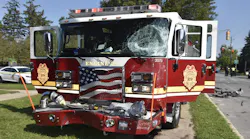 The 71-year-old driver of a silver Jeep Liberty was killed when her vehicle collided with an Indianapolis Fire Department responding to a residential blaze Sunday.