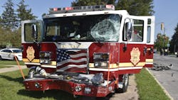 The 71-year-old driver of a silver Jeep Liberty was killed when her vehicle collided with an Indianapolis Fire Department responding to a residential blaze Sunday.
