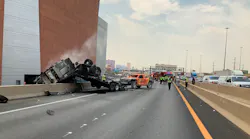 Three people, including a child, were killed in a Las Vegas crash between a white sedan and a truck pulling an off-road vehicle Thursday.