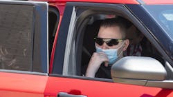 Lubbock, TX, firefighter Matt Dawson looks out the window as his vehicle gets ready to leave the reception at Lubbock Fire Administration on Thursday. Dawson has been in rehabilitation in Englewood, CO, after being struck by a vehicle on I-27 on Jan. 11.