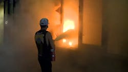 Minneapolis crews rescued two people and battled fires at four businesses amid riots and looting late Wednesday. Minneapolis crews rescued two people and battled fires at four businesses amid riots and looting late Wednesday.