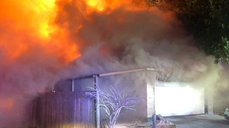 Montgomery County, VA, firefighters rescued an unconscious 18-year-old woman who was inside a closet in a burning home in Willis early Tuesday.