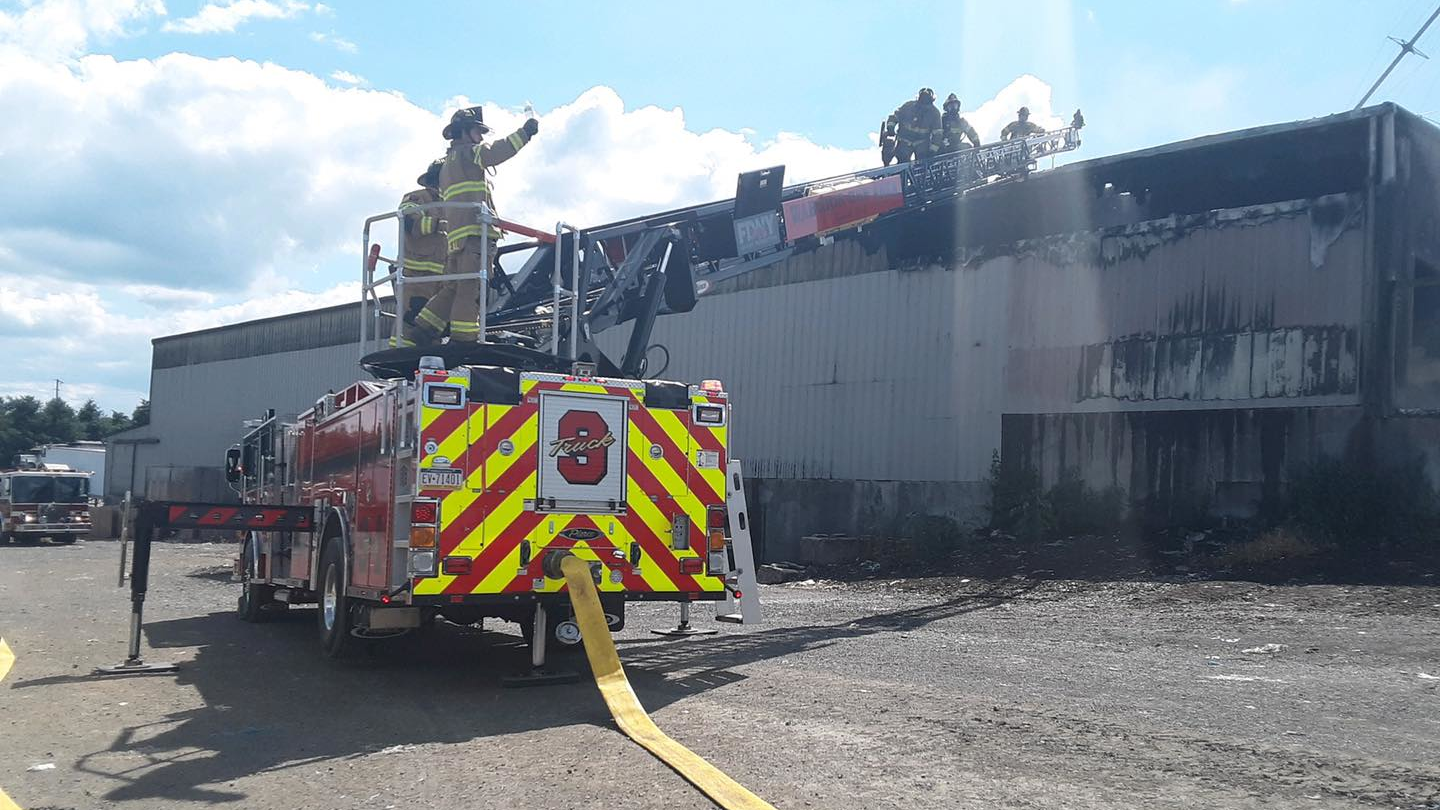 Crews from multiple departments battled a mill blaze in Lewis Township, PA, that injured two firefighters Sunday.