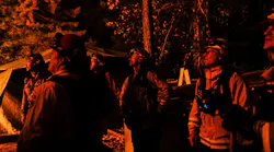 Firefighters respond to a structure fire in Boulder Creek, CA, during operations against CZU Lightning Complex Fire on Aug. 23, 2020.