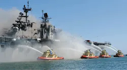 Firefighting boats work to put out the massive, multi-alarm blaze aboard the USS Bonhomme Richard in San Diego in July.
