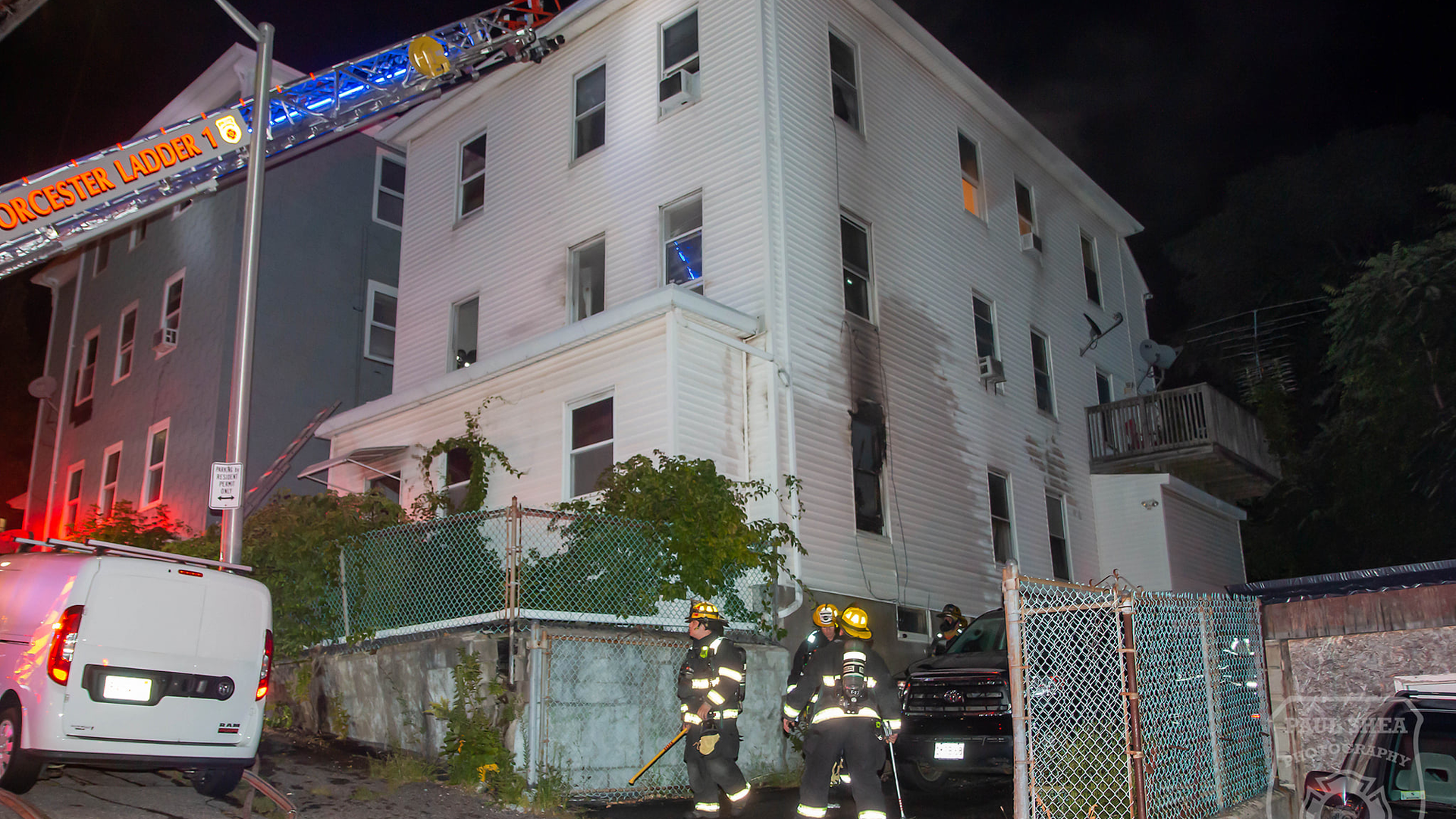 Worcester, MA, firefighters rescued two people who climbed out of a second-floor window to the roof an exterior porch during a two-alarm blaze early Saturday.