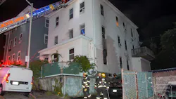 Worcester, MA, firefighters rescued two people who climbed out of a second-floor window to the roof an exterior porch during a two-alarm blaze early Saturday.