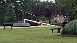 A severed flagpole rests on the ground at a 9/11 memorial in Washingtonville, NY, on July 9, 2020. A severed flagpole rests on the ground at a 9/11 memorial in Washingtonville, NY, on July 9, 2020.