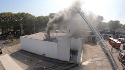 Figure 12: Exterior conditions through the open vertical vent and at the front door following initial suppression. Figure 12: Exterior conditions through the open vertical vent and at the front door following initial suppression.
