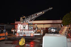 Tulare Fire Department&rsquo;s Truck 61 arrived on scene last among the four apparatus that responded to a reported commercial structure fire. Because the incident commander identified the fire as burning on the exterior of a metal roof, he staged the vehicle rather than move it into position.