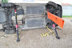The bright-colored JYD Industries’ Extrication Protection Cover, which has magnet-imbedded corners, acts to identify the ratchet strap during a vehicle-stabilization effort. The bright-colored JYD Industries’ Extrication Protection Cover, which has magnet-imbedded corners, acts to identify the ratchet strap during a vehicle-stabilization effort.