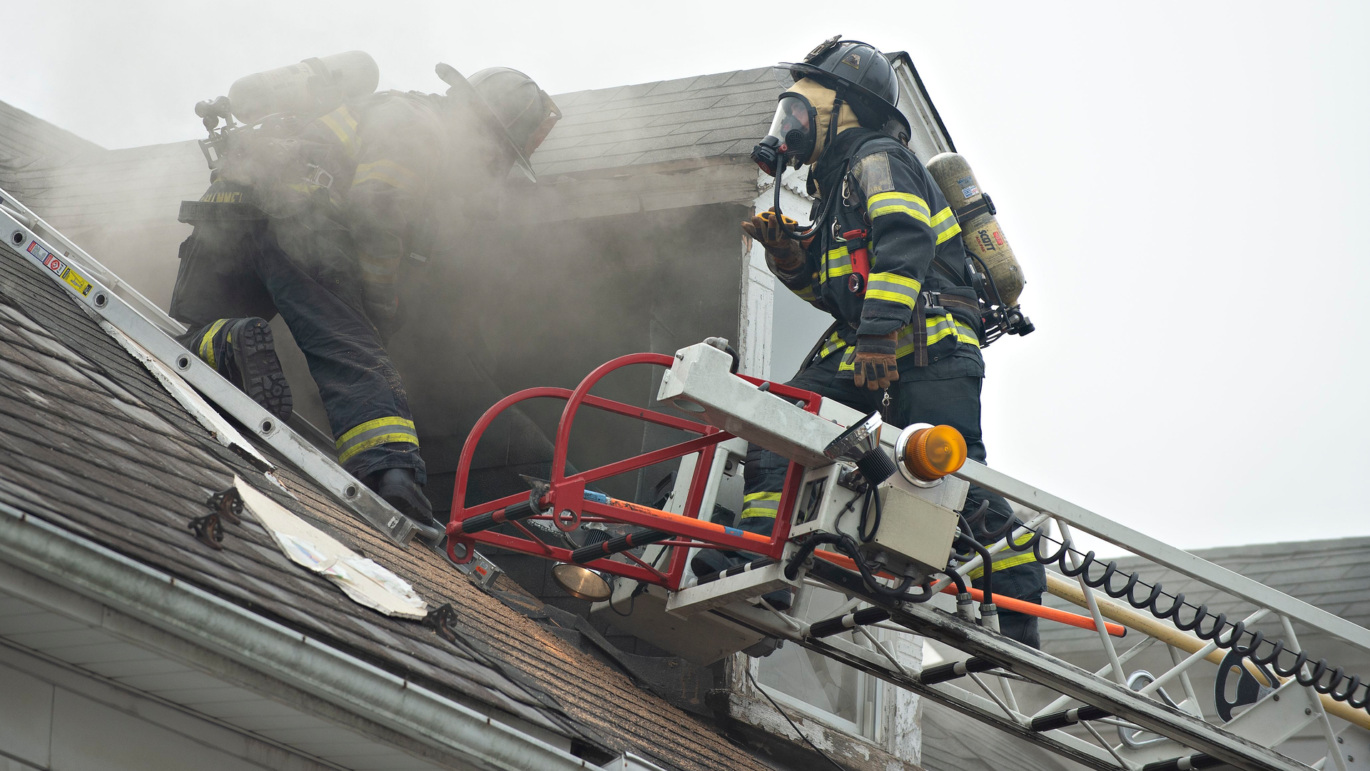 Allentown, PA, firefighters battle hot spots during a three-alarm blaze that damaged a couple of row homes Thursday.