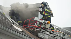 Allentown, PA, firefighters battle hot spots during a three-alarm blaze that damaged a couple of row homes Thursday.