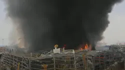 A massive fire erupted at a warehouse at Beirut's port Thursday a month after a devastating explosion. A massive fire erupted at a warehouse at Beirut's port Thursday a month after a devastating explosion.