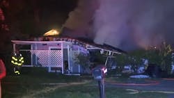 Crews from multiple fire departments battled a blaze that erupted after a house explosion in Commerce Township early Thursday. Crews from multiple fire departments battled a blaze that erupted after a house explosion in Commerce Township early Thursday.