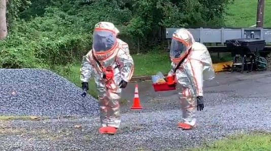 D.C. Fire and EMS firefighters respond to a Freon leak from a building's air-conditioning chiller Wednesday.
