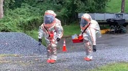 D.C. Fire and EMS firefighters respond to a Freon leak from a building's air-conditioning chiller Wednesday. D.C. Fire and EMS firefighters respond to a Freon leak from a building's air-conditioning chiller Wednesday.