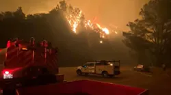 Two firefighters were severely injured after deploying a shelter with 13 other firefighters while battling the Dolan Fire in Lost Padres National Forest near Big Sur, CA, on Tuesday.