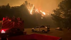 Two firefighters were severely injured after deploying a shelter with 13 other firefighters while battling the Dolan Fire in Lost Padres National Forest near Big Sur, CA, on Tuesday. Two firefighters were severely injured after deploying a shelter with 13 other firefighters while battling the Dolan Fire in Lost Padres National Forest near Big Sur, CA, on Tuesday.