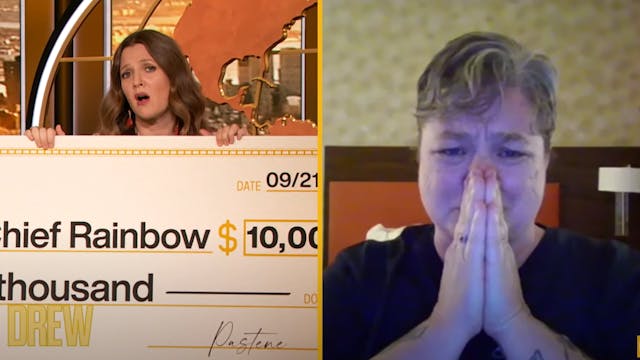 Talk show host and actress Drew Barrymore presents Upper McKenzie, OR, Fire Chief Christiana Rainbow Plews with a check for $10,000 on Monday after she lost her two homes to the Holiday Farm Fire last week.