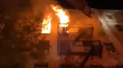 FDNY firefighters performed a daring rope rescue from the roof a six-story Manhattan apartment building to save a 5-year-old girl trapped during a two-alarm blaze early Tuesday.