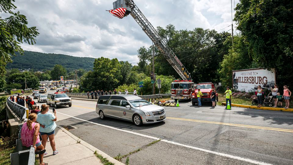 First responders gather at a funeral home in Millersburg, PA, to honor Halifax firefighter and tow truck driver Tyler Laudenslager, who was killed while offering roadside assistance on Interstate 78 in July.