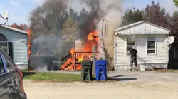 The Hinesburg, VT, fire chief was wounded by a stray round from live ammunition inside a mobile home that discharged during a fire Saturday.