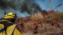 Inmate firefighters clear brush as they work to slow down the spread of the Maria Fire on the Santa Clara river bed, in Santa Paula, CA, on Nov. 1, 2019. Inmate firefighters clear brush as they work to slow down the spread of the Maria Fire on the Santa Clara river bed, in Santa Paula, CA, on Nov. 1, 2019.