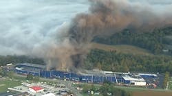 Firefighters from around a dozen departments battled a massive blaze at a manufacturing plant in Malvern, OH, on Tuesday. Firefighters from around a dozen departments battled a massive blaze at a manufacturing plant in Malvern, OH, on Tuesday.