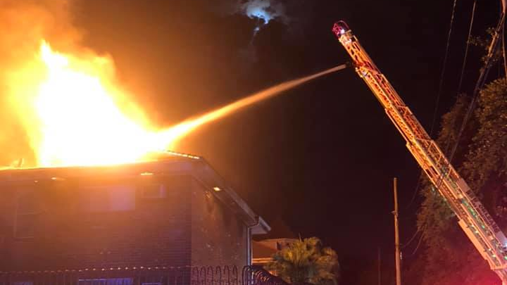 New Orleans firefighters battled a three-alarm blaze that broke out in a two-story apartment complex in the city's Garden District late Monday.