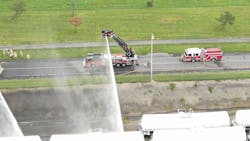 Selkirk, NY, firefighters doused a railroad tanker to keep it cool following a chemical gas leak Tuesday.