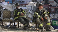 Firefighters rest during the cleanup operation at the World Trade Center in New York City after the towers were demolished by a terrorist attack on Sept. 11, 2001. Firefighters rest during the cleanup operation at the World Trade Center in New York City after the towers were demolished by a terrorist attack on Sept. 11, 2001.