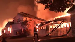 Firefighters battled the Shady Fire as its out-of-control flames engulf homes in Santa Rosa, CA, late Sunday and early Monday.